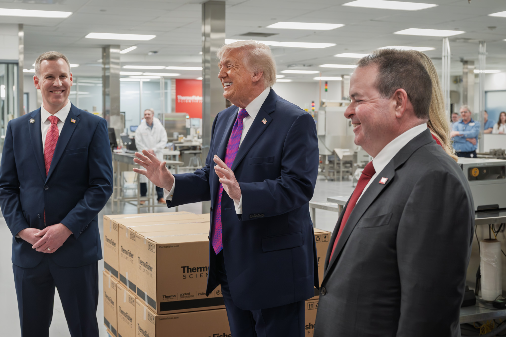 A lighter moment with company leaders on the production floor